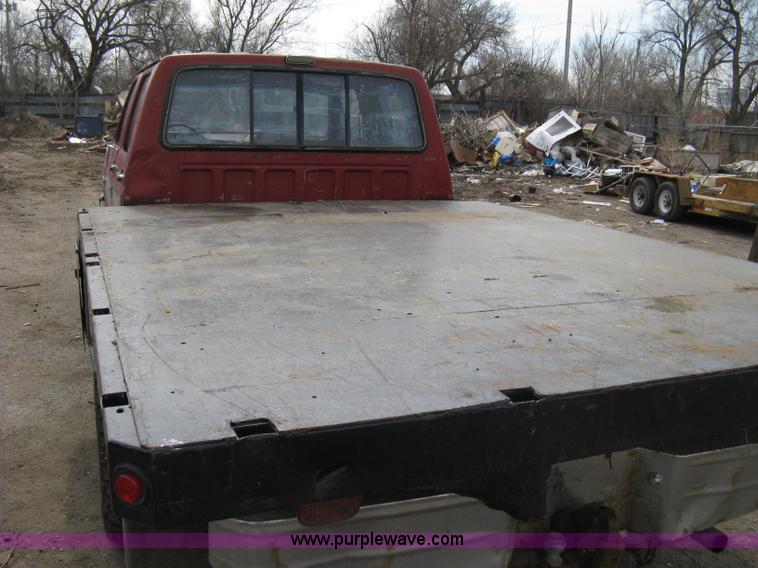 image for item 8012 1991 Ford F350 Custom XLT Lariat four-door flatbed dually pickup