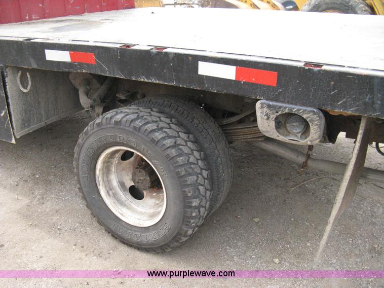 image for item 8012 1991 Ford F350 Custom XLT Lariat four-door flatbed dually pickup