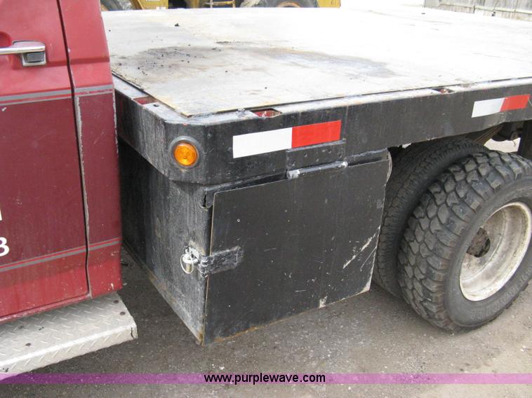 image for item 8012 1991 Ford F350 Custom XLT Lariat four-door flatbed dually pickup