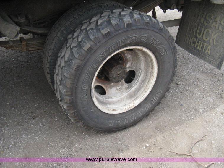 image for item 8012 1991 Ford F350 Custom XLT Lariat four-door flatbed dually pickup