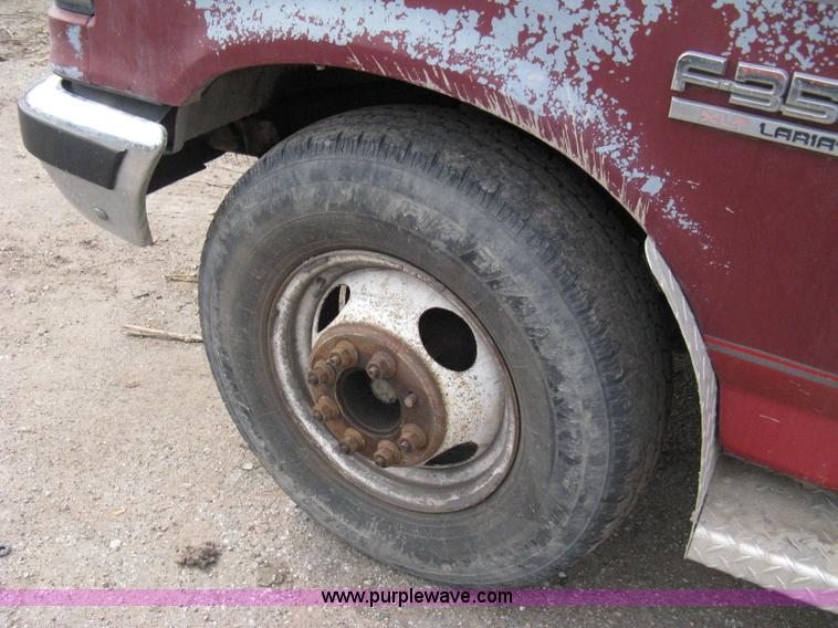 image for item 8012 1991 Ford F350 Custom XLT Lariat four-door flatbed dually pickup