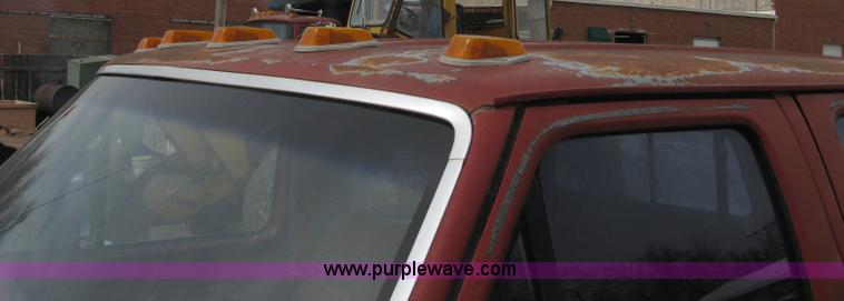 image for item 8012 1991 Ford F350 Custom XLT Lariat four-door flatbed dually pickup