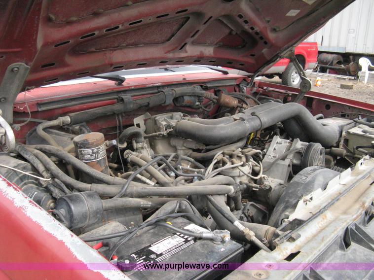 image for item 8012 1991 Ford F350 Custom XLT Lariat four-door flatbed dually pickup