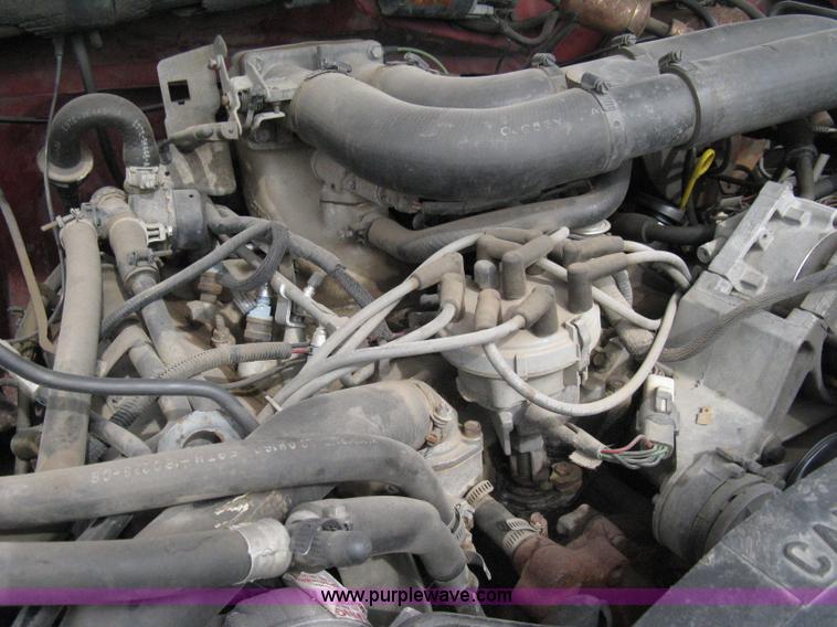 image for item 8012 1991 Ford F350 Custom XLT Lariat four-door flatbed dually pickup