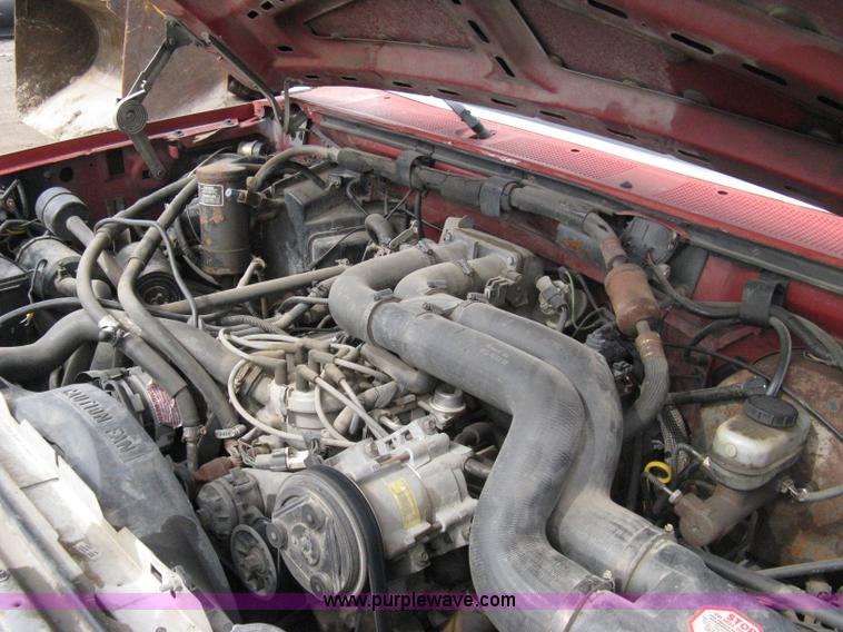 image for item 8012 1991 Ford F350 Custom XLT Lariat four-door flatbed dually pickup