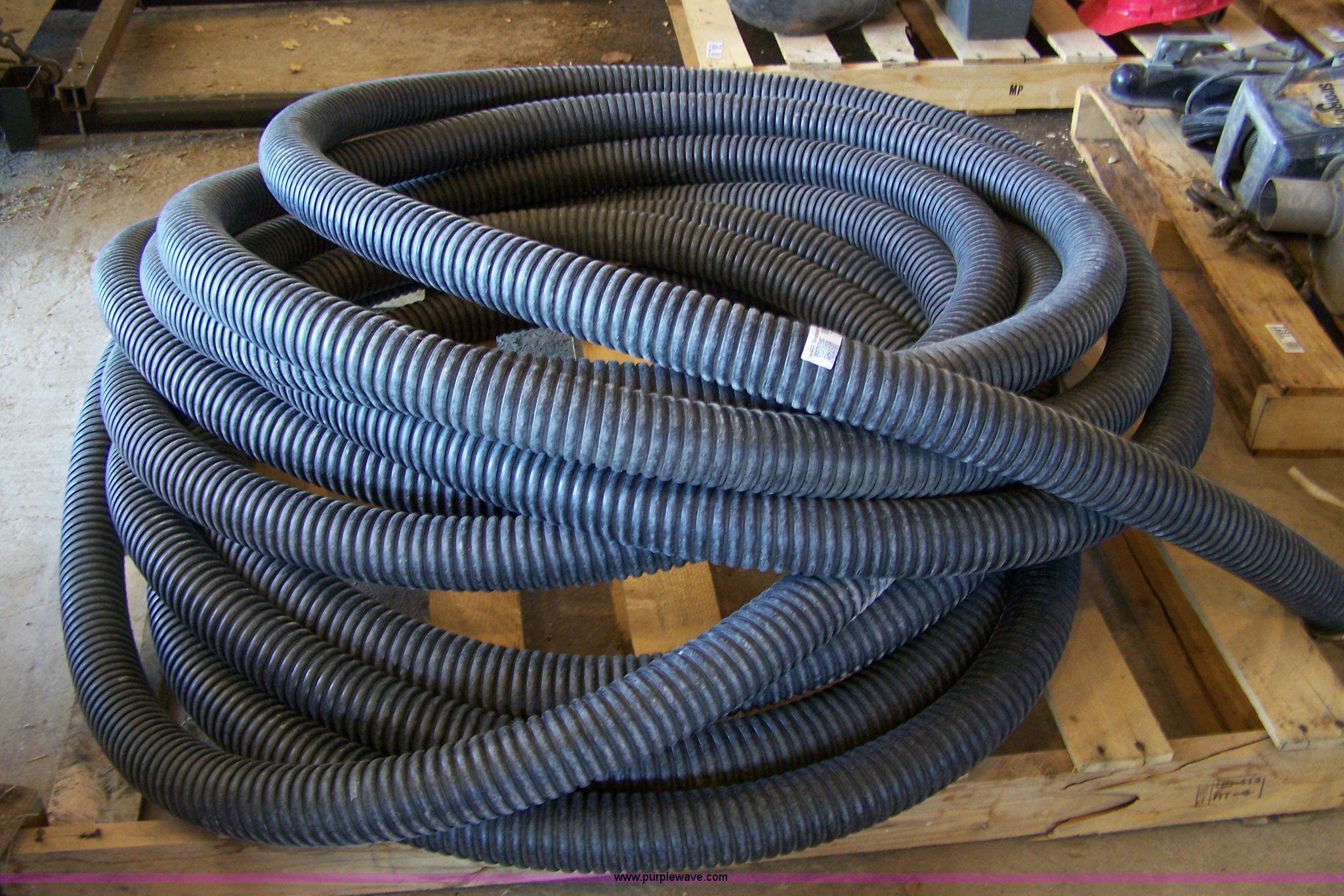 100' of 2" hard suction hose in Quinter, KS Item 7312 sold Purple Wave