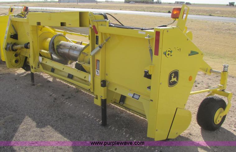 image for item 3519 2009 John Deere 640B pick up forage head