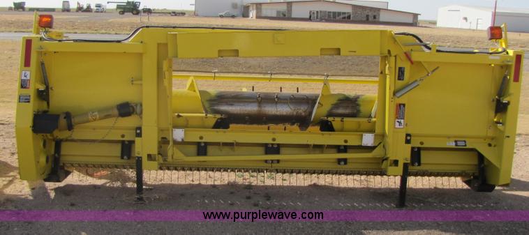image for item 3519 2009 John Deere 640B pick up forage head