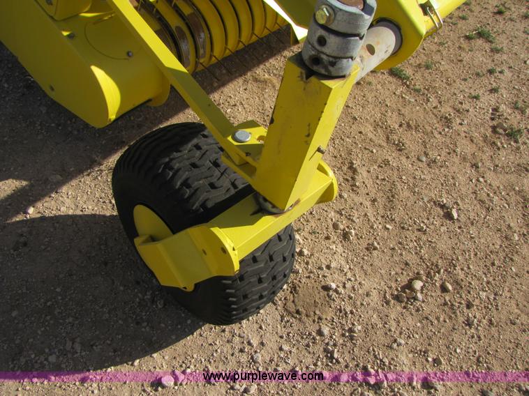 image for item 3519 2009 John Deere 640B pick up forage head