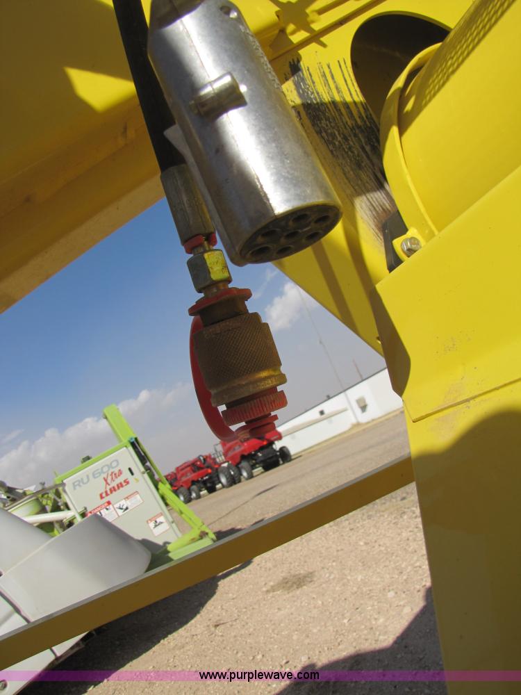 image for item 3519 2009 John Deere 640B pick up forage head