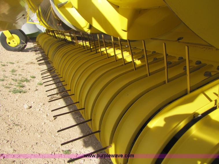 image for item 3519 2009 John Deere 640B pick up forage head