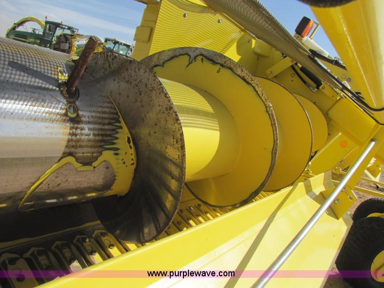 image for item 3519 2009 John Deere 640B pick up forage head