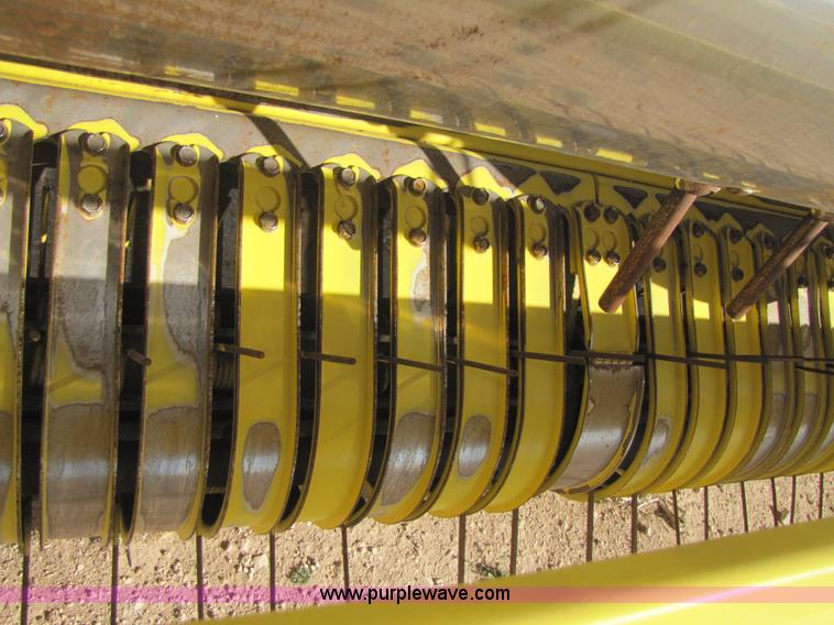 image for item 3519 2009 John Deere 640B pick up forage head