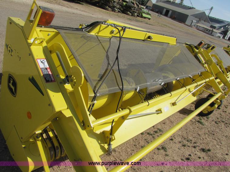 image for item 3519 2009 John Deere 640B pick up forage head