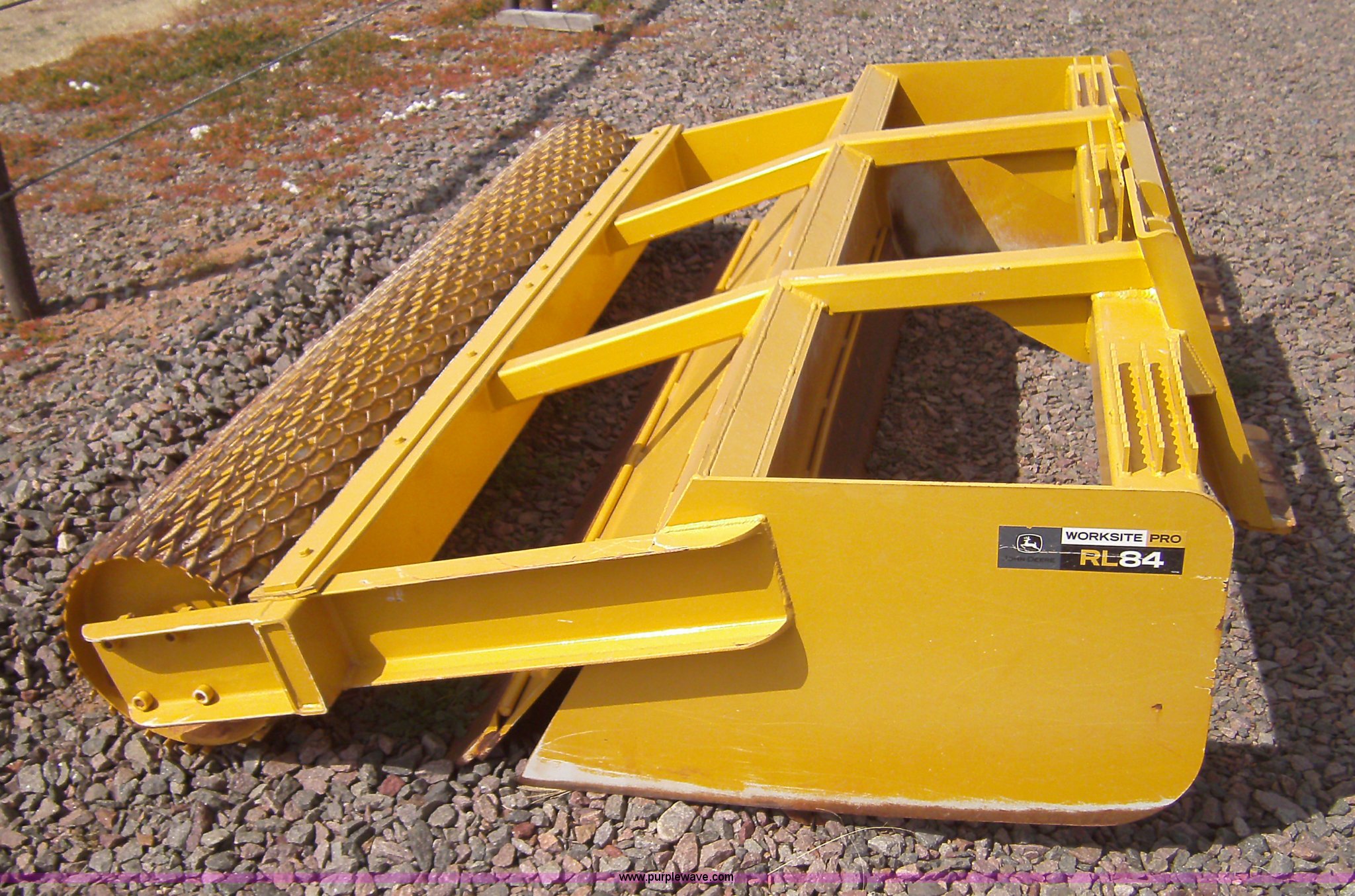 John Deere Worksite Pro RL84 road leveler skid steer attachment in