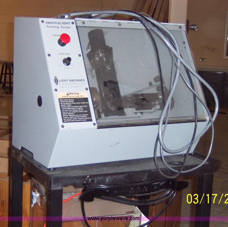 Light Machine Spectra Light turning center training module in Lawrence