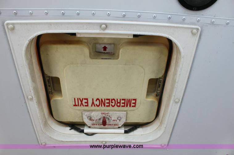 image for item 6329 2000 Blue Bird TC2000 school bus