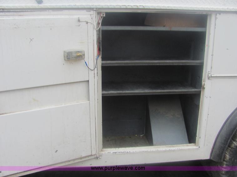 image for item 6938 1985 Ford F700 bucket truck