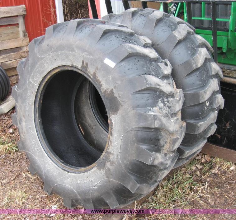 image for item 8511 (2) Goodyear heavy duty 16.9-24 tires