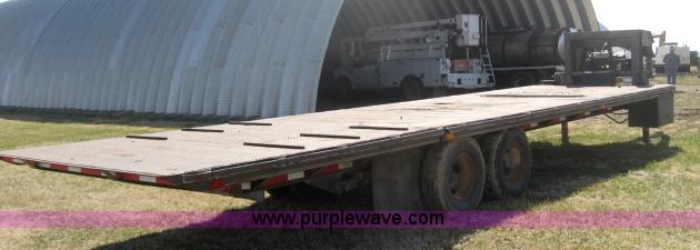 image for item 5932 1998 Neal Mfg. flatbed goose neck trailer
