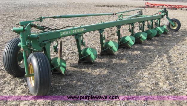 image for item 5961 John Deere eight bottom plow