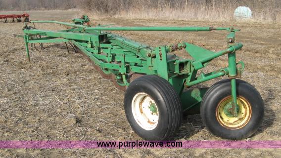 image for item 5961 John Deere eight bottom plow