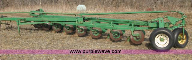 image for item 5961 John Deere eight bottom plow