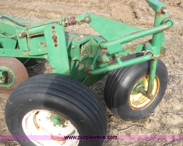 image for item 5961 John Deere eight bottom plow