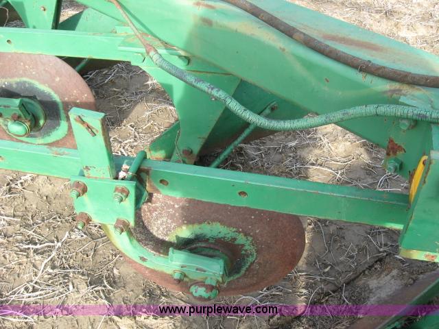 image for item 5961 John Deere eight bottom plow