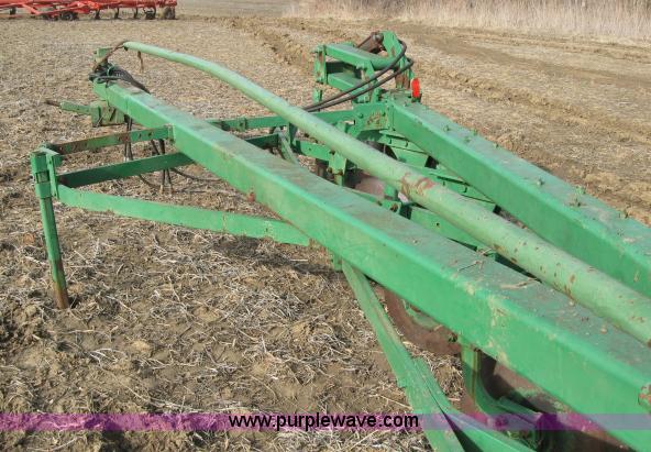 image for item 5961 John Deere eight bottom plow