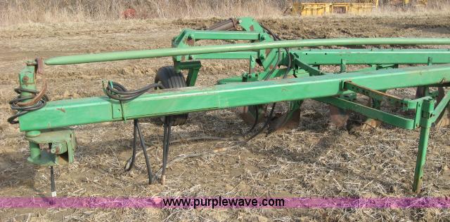 image for item 5961 John Deere eight bottom plow