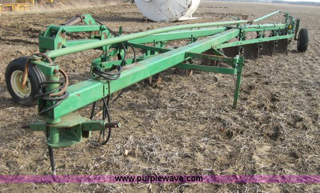 image for item 5961 John Deere eight bottom plow