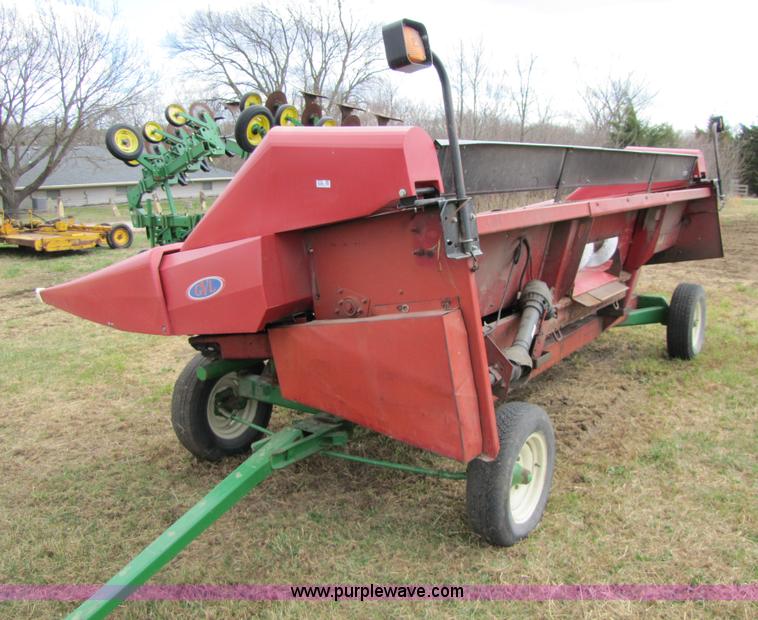 image for item 8725 1995 Case 1063 six row corn head and header trailer