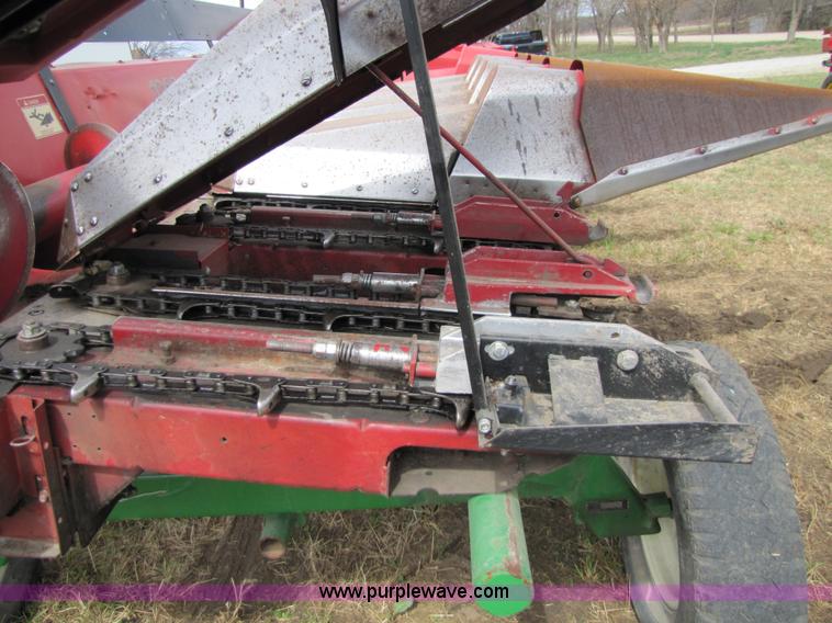 image for item 8725 1995 Case 1063 six row corn head and header trailer