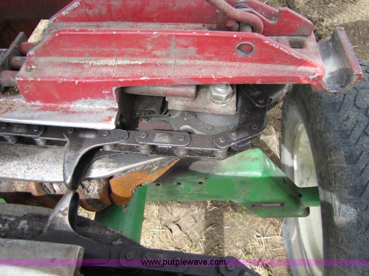 image for item 8725 1995 Case 1063 six row corn head and header trailer