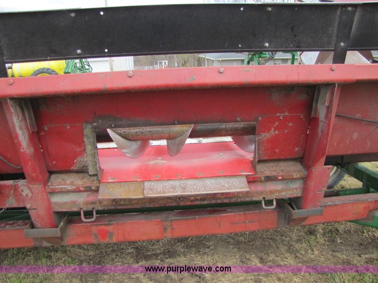 image for item 8725 1995 Case 1063 six row corn head and header trailer