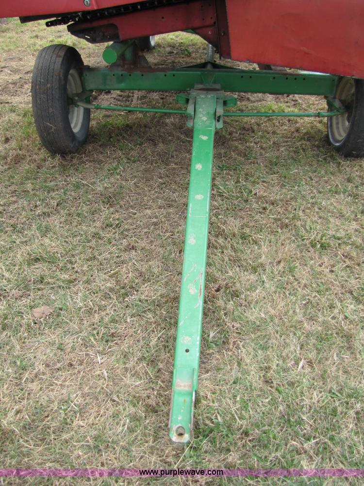 image for item 8725 1995 Case 1063 six row corn head and header trailer