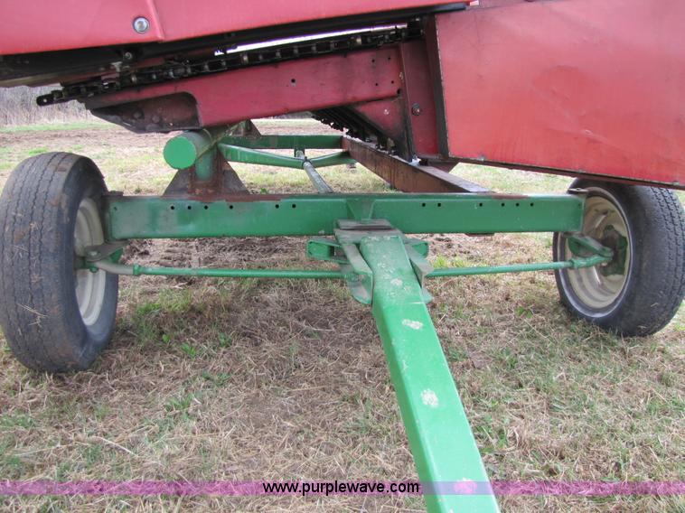 image for item 8725 1995 Case 1063 six row corn head and header trailer