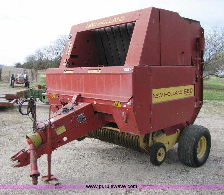 image for item 8739 New Holland 660 auto-wrap round baler