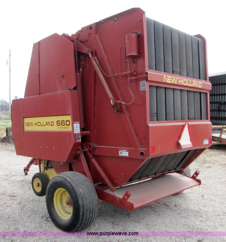 image for item 8739 New Holland 660 auto-wrap round baler