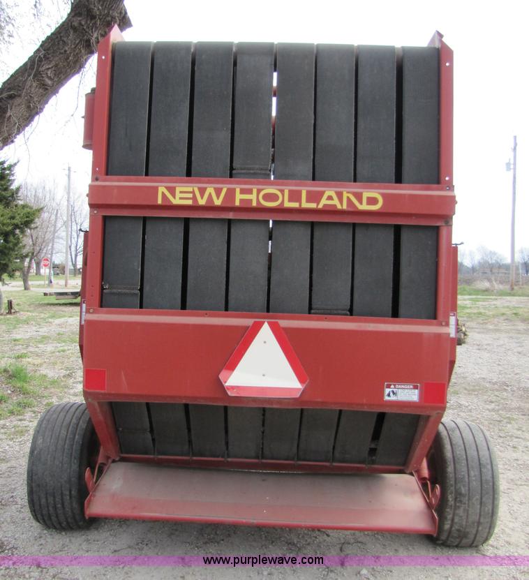 image for item 8739 New Holland 660 auto-wrap round baler