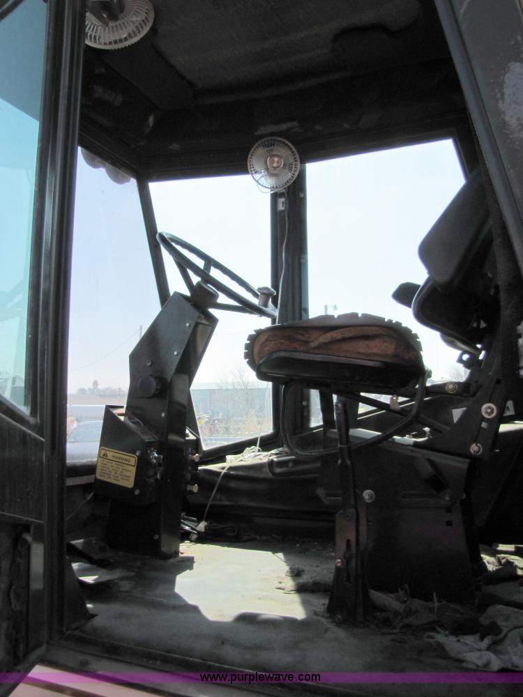 image for item 8744 Hesston 6455 self propelled swather