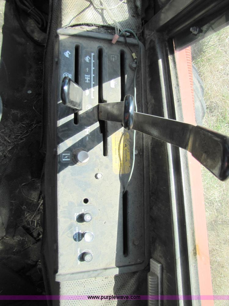 image for item 8744 Hesston 6455 self propelled swather