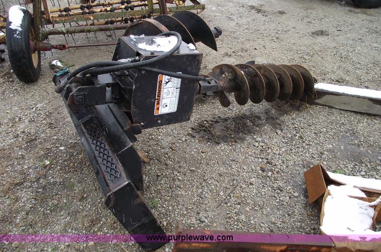 image for item 5509 Lowe skid steer auger with three bits