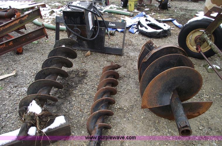 image for item 5509 Lowe skid steer auger with three bits