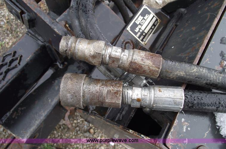 image for item 5509 Lowe skid steer auger with three bits