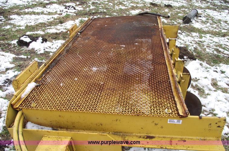 image for item 5511 Skid steer 18" footing digger