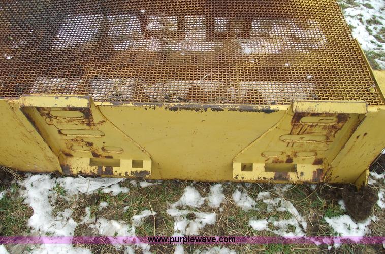 image for item 5511 Skid steer 18" footing digger