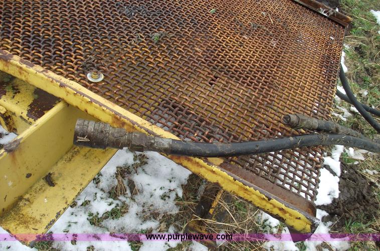 image for item 5511 Skid steer 18" footing digger