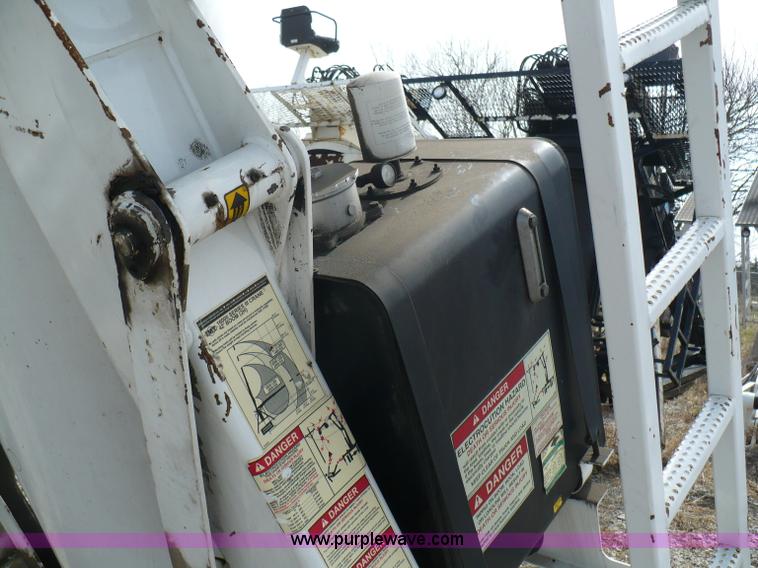 image for item 5998 2004 IMT 16000 hydraulic loader/wallboard crane